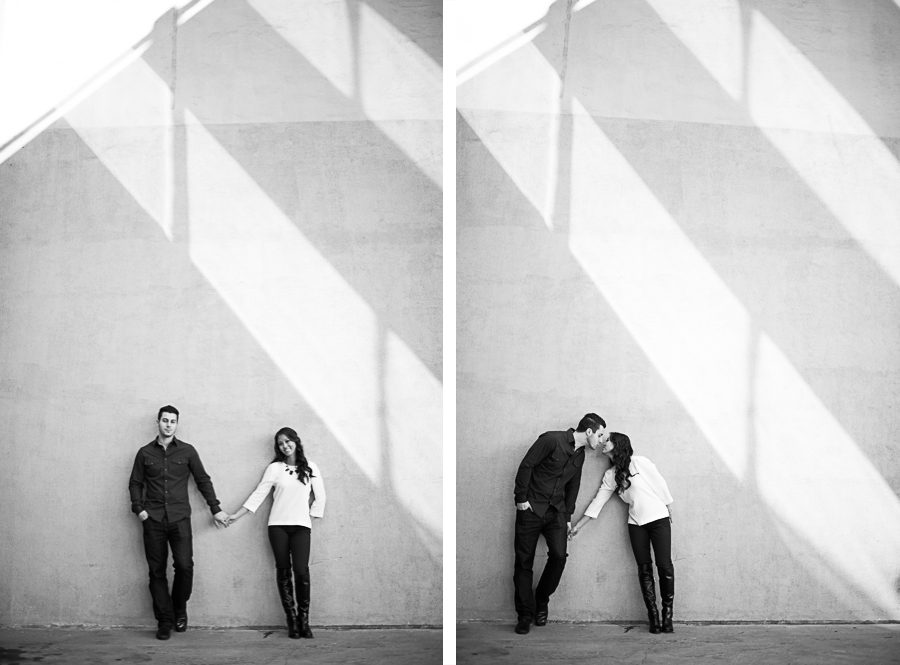 Christine and Chalita pose along a wall in historic Georgetown during their engagement session with DC wedding photographer Ben Lau.