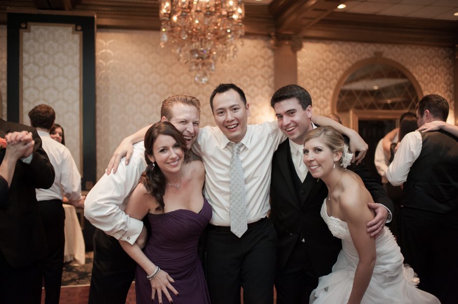 Wedding Photographer Ben Lau with two of his couples during a wedding reception at the Madison Hotel in Morristown, NJ. Captured by NJ wedding photographer Ben Lau.