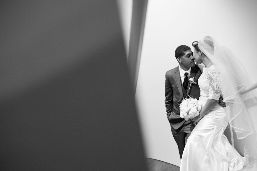 Bride and groom pose for portraits in Maritime Parc in Jersey City, NJ. Captured by NJ wedding photographer Ben Lau.