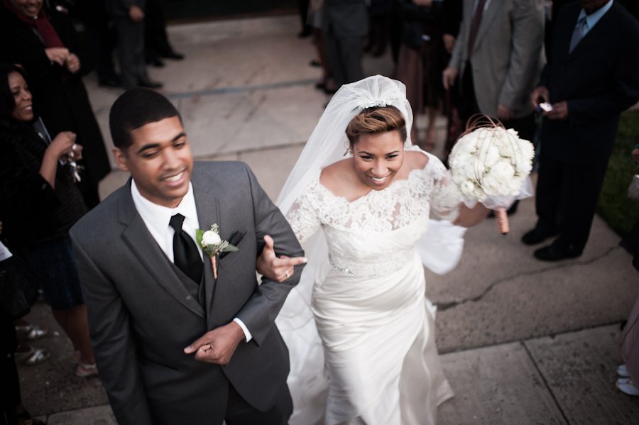 Bride and groom exit after their wedding at St. George's Episcopal Church in Maplewood, NJ. Captured by NJ wedding photographer Ben Lau.