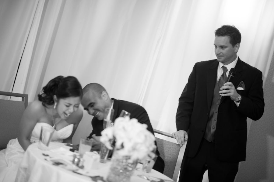 Best man speaks during a wedding at the Marriott Crystal City in Arlington, VA. Caputred by Northern Virginia wedding photographer Ben Lau.