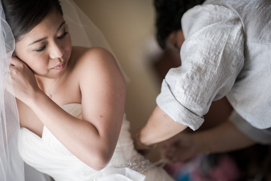 Bride gets ready for her wedding day at the Marriott Crystal City in Arlington VA. Caputred by Northern Virginia wedding photographer Ben Lau.