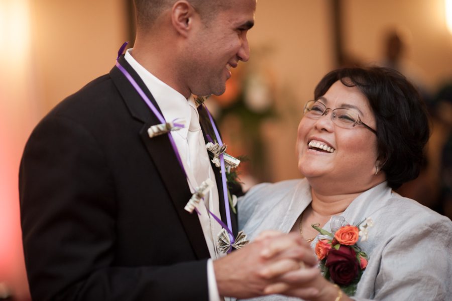 Groom dances with mother-in-law during wedding at the Marriott Crystal City in Arlington, VA. Caputred by Northern Virginia wedding photographer Ben Lau.