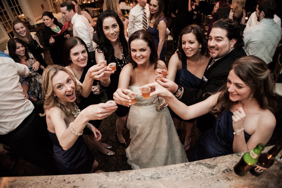 Guests share a toast during Lauren and John's wedding at Mercer Oaks in Princeton Junction, NJ. Captured by NJ wedding photographer Ben Lau.