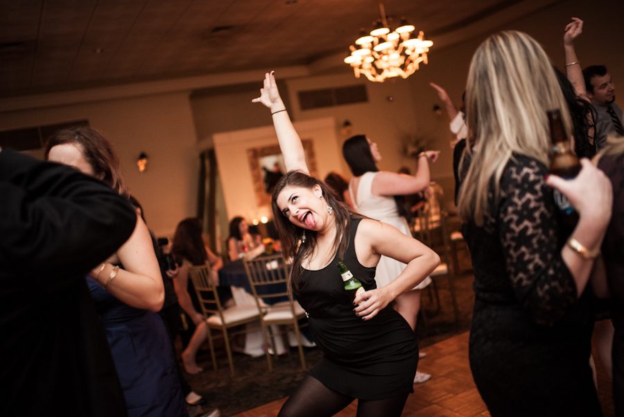Guests dance during Lauren and John's wedding at Mercer Oaks in Princeton Junction, NJ. Captured by NJ wedding photographer Ben Lau.