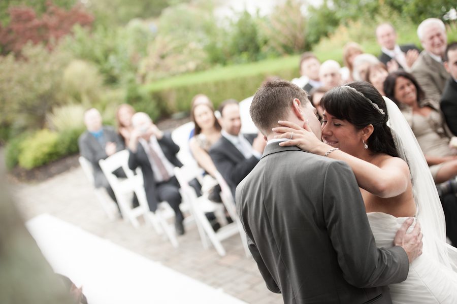 Outdoor wedding ceremony at The Mill in Spring Lake Heights, NJ. Captured by northern NJ wedding photographer Ben Lau.