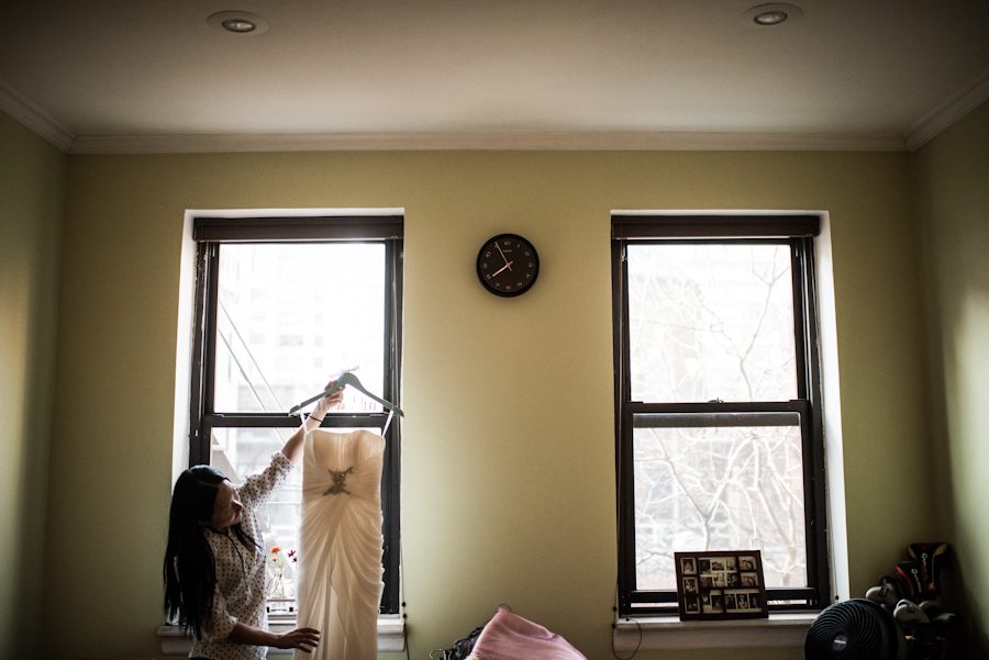 Bride gets ready for her wedding at Morans in Chelsea, NY. Captured by NYC wedding photographer Ben Lau.