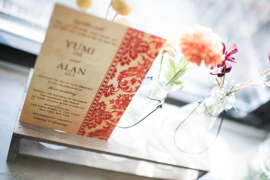 Stationery and flowers for a wedding at Morans in Chelsea, NY. Captured by NYC wedding photographer Ben Lau.