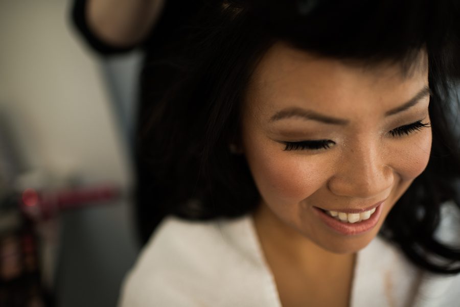 Bride preps for her wedding ceremony at the Mondrian SoHo before her New York City Hall. Captured by NYC wedding photographer Ben Lau Photography.