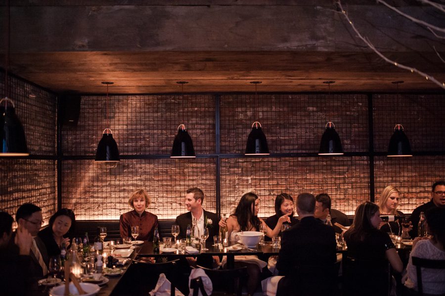 Wedding dinner at the Tartinery in NoLiTa, NY. Captured by NYC wedding photographer Ben Lau Photography.