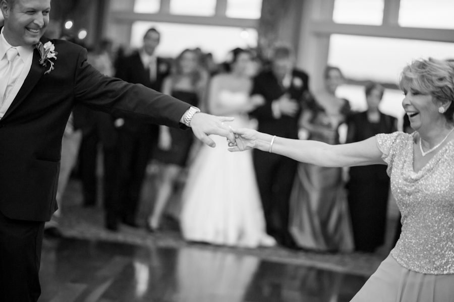Groom and his mother dance during his wedding reception at Clarks Landing in Point Pleasant, NJ. Captured by northern NJ wedding photographer Ben Lau.