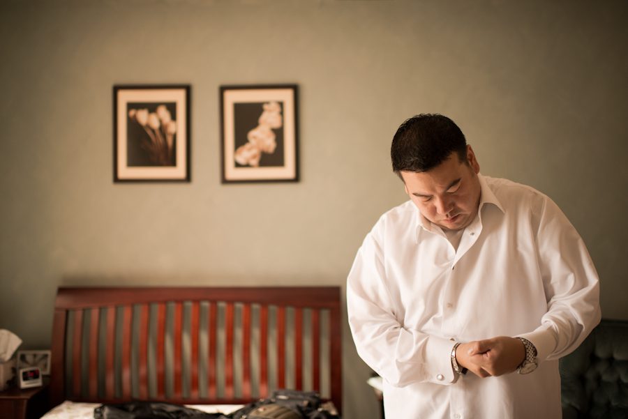 Groom gets ready for his wedding day in Brooklyn, NY. Captured by Ben Lau Photography.