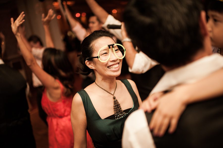 Dancing during a wedding reception at Mudan's in Flushing, NY. Captured by Ben Lau Photography.