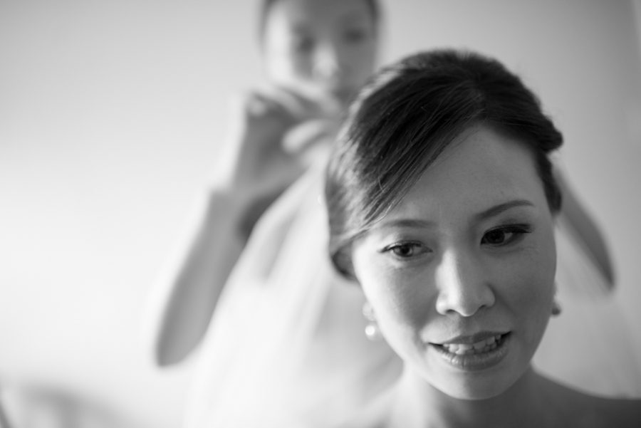 Bride gets ready on her wedding day in Brooklyn, NY. Captured by Ben Lau Photography.
