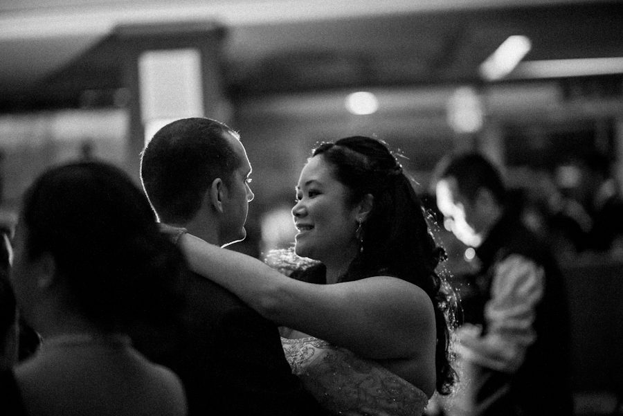Jenny and Jeff's first dances at their wedding reception at Pacificana in Brooklyn, NY. Captured by NYC wedding photographer Ben Lau.