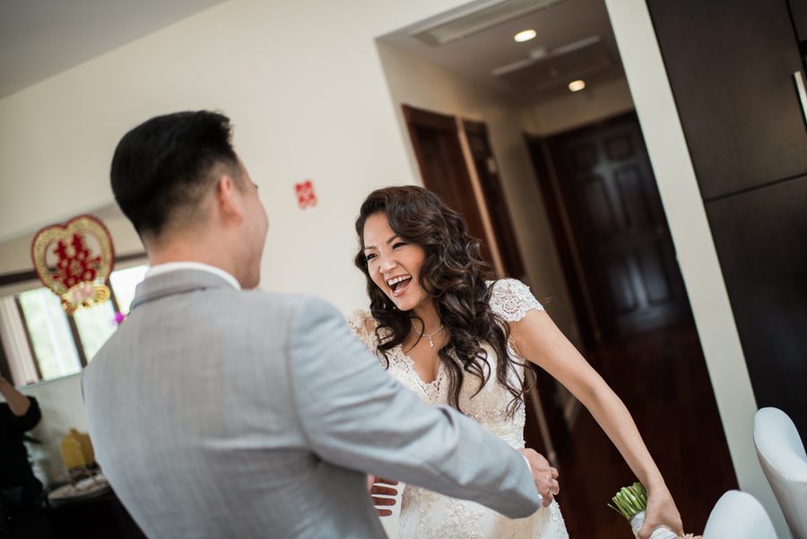 First look at home before Sally and Terence's wedding at the VIP Country Club in Westchester, NY. Captured by NYC wedding photographer Ben Lau.