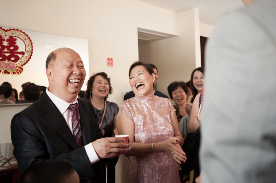 Tea Ceremony on the morning of Sally and Terence's wedding at the VIP Country Club in Westchester, NY. Captured by NYC wedding photographer Ben Lau.