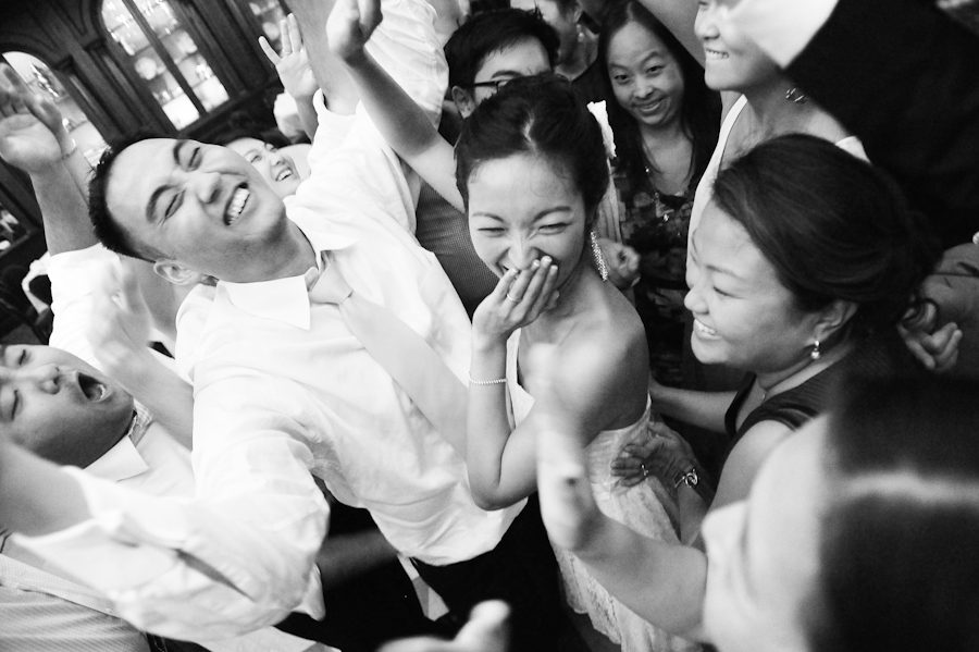Bride and groom dance during the wedding reception at the Manor in West Orange, NJ. Captured by Ben Lau Photography.