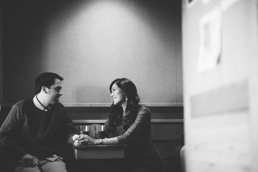 Julia and Jeff share a cup of coffee during their engagement session at a Princeton University.