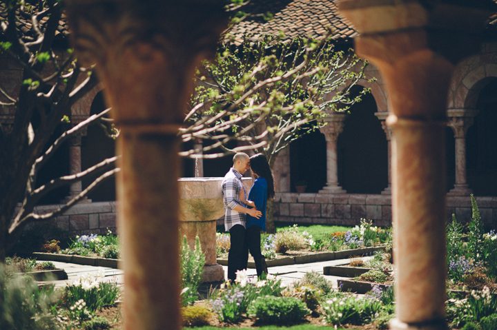 Lisa and Cyrus pose in the courtyard during their engagement session with NYC wedding photographer Ben Lau.