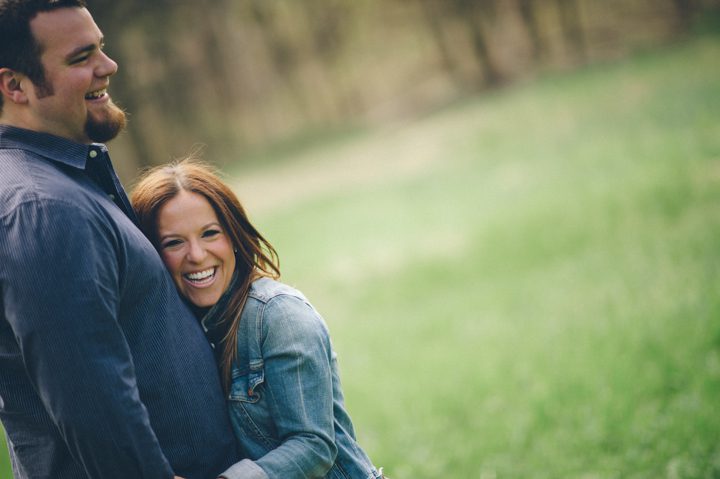 Couple shares a laugh during their engagement session in Morristown with NJ wedding photographer Ben Lau.