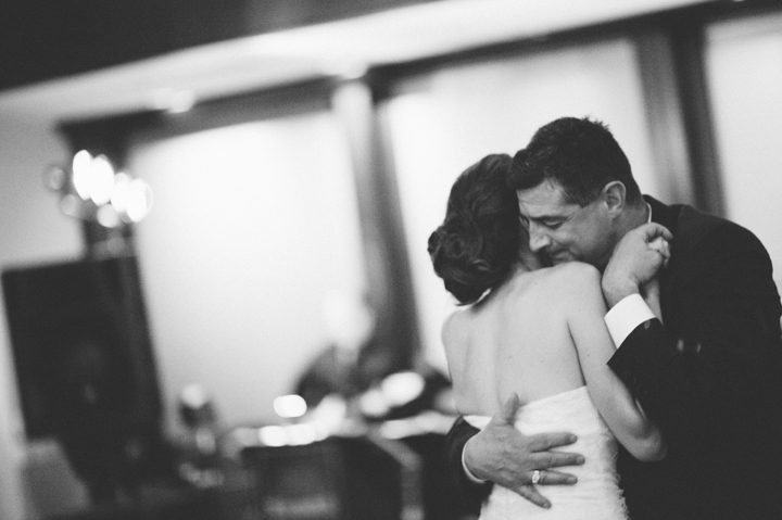 Father and daughter dance during a wedding reception at the Phoenixville Foundry in Phoenixville, Pa. Captured by Northern NY wedding photographer Ben Lau.