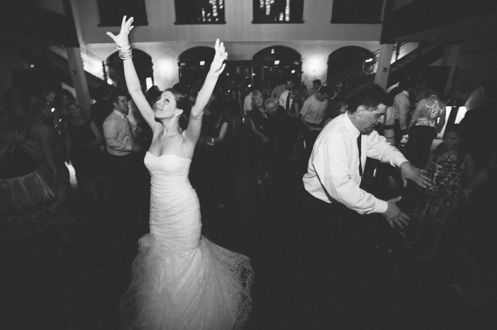 Bride dances with her father during a wedding reception at the Phoenixville Foundry in Phoenixville, Pa. Captured by Northern NY wedding photographer Ben Lau.
