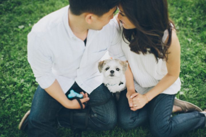 A couple and their dog during their engagement session in DUMBO with NYC wedding photographer Ben Lau.