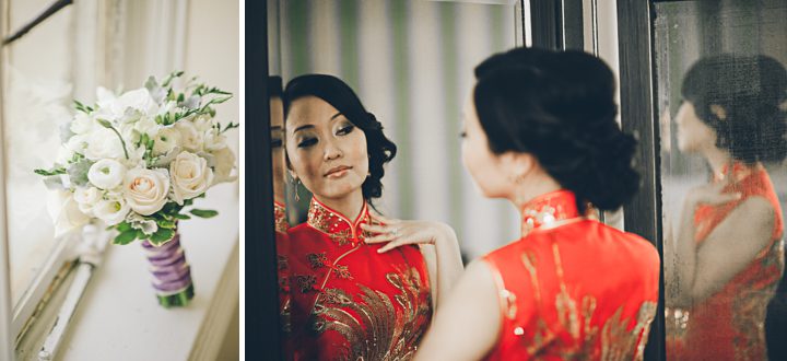Bride checks herself in the mirror on the morning of her wedding at Hempstead House in Sands Point Preserve, Long Island. Captured by NYC wedding photographer Ben Lau.