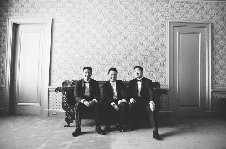 Groomsmen pose for a portrait at the Hempstead House in Sands Point Preserve, Long Island. Captured by NYC wedding photographer Ben Lau.