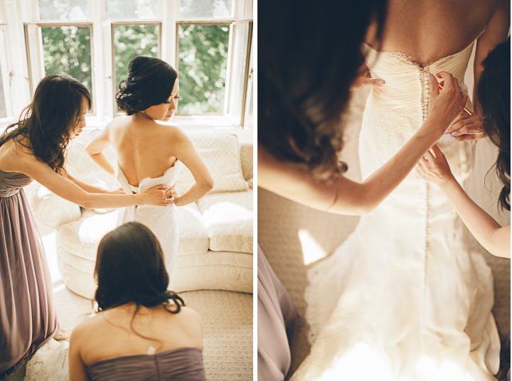 Bride steps into her gown on the morning of her wedding at the Hempstead House in Sands Point Preserve, Long Island. Captured by NYC wedding photographer Ben Lau.