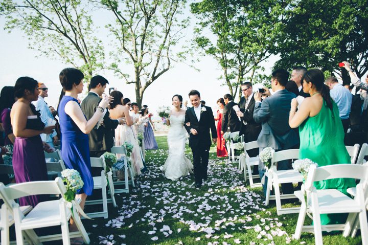 Wedding ceremony at the Hempstead House in Sands Point Preserve, Long Island. Captured by NYC wedding photographer Ben Lau.