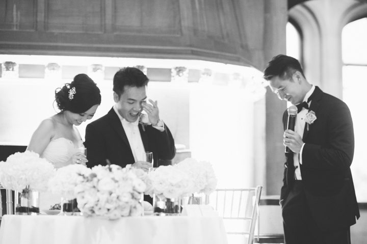 Speeches during a wedding at the Hempstead House in Sands Point Preserve, Long Island. Captured by NYC wedding photographer Ben Lau.