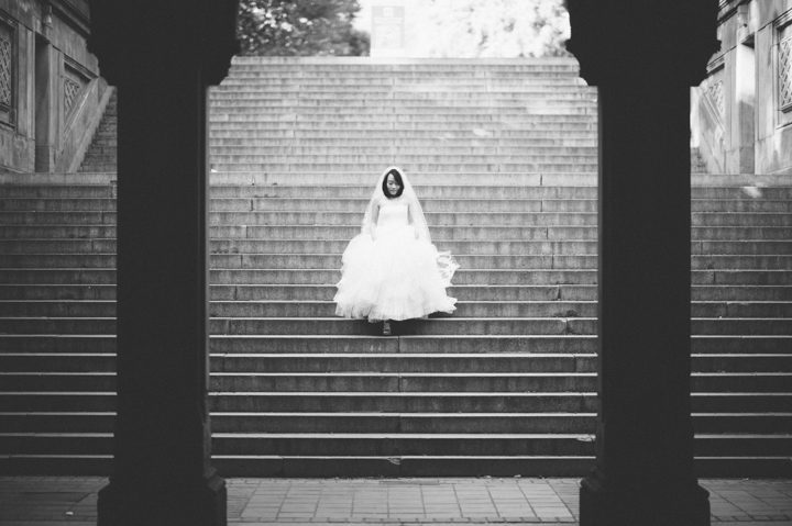 Bride descends the stairs at Central Park during her bridal session with NYC wedding photographer Ben Lau.