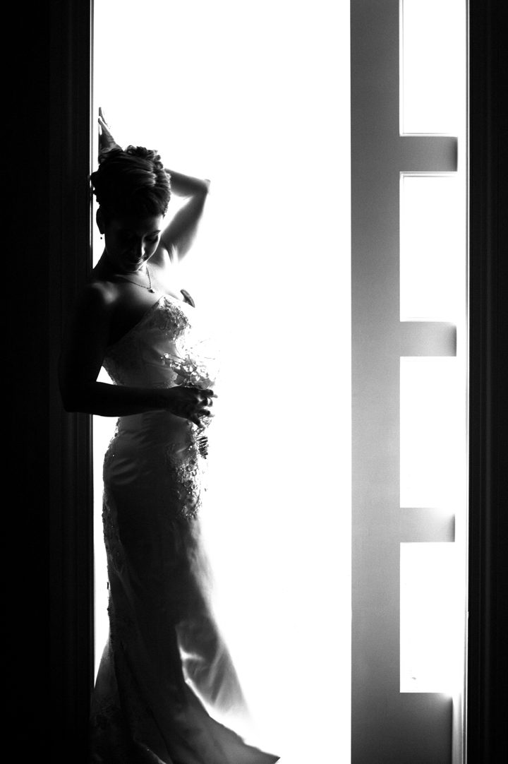 Bride poses for portraits on her wedding day at the Old Tappan Manor in Old Tappan, NJ. Captured by Northern New Jersey Wedding Photographer Ben Lau.