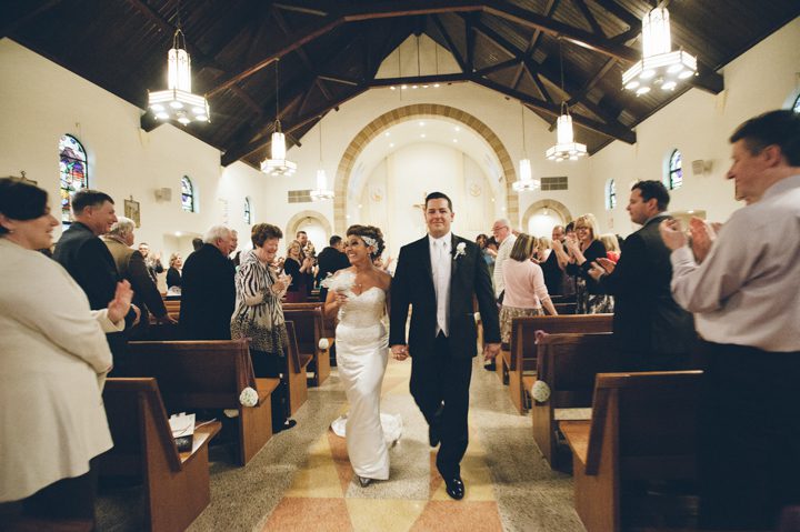 Bride and groom exit the church and make their way to the Old Tappan Manor in Old Tappan, NJ. Captured by Northern New Jersey Wedding Photographer Ben Lau.