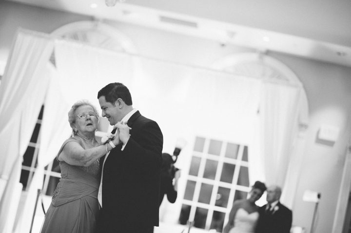 Mother and son dance during a wedding reception at the Old Tappan Manor in Old Tappan, NJ. Captured by Northern New Jersey Wedding Photographer Ben Lau.