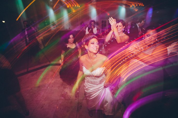 Guests dance during a wedding reception at the Old Tappan Manor in Old Tappan, NJ. Captured by Northern New Jersey Wedding Photographer Ben Lau.
