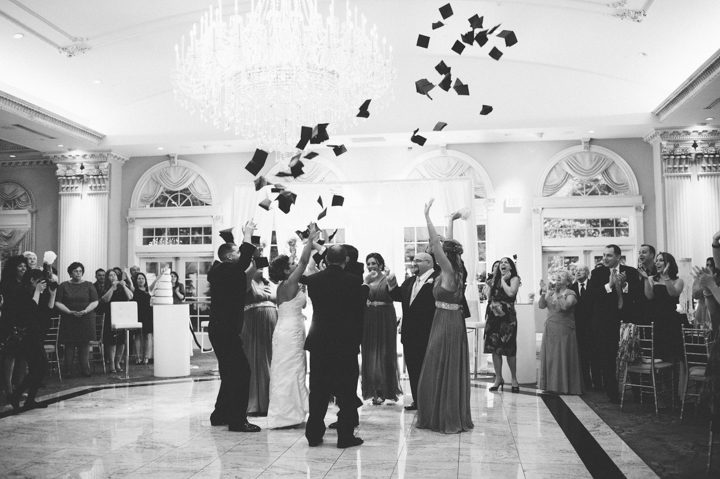 Guests pose for a photo during a wedding reception at the Old Tappan Manor in Old Tappan, NJ. Captured by Northern New Jersey Wedding Photographer Ben Lau.