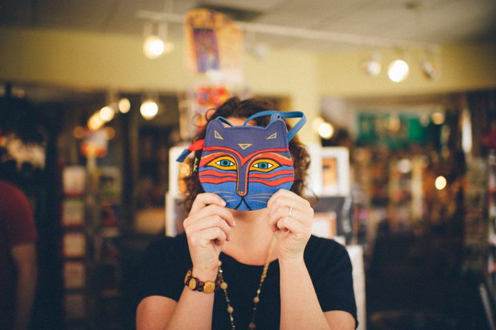 A couple dons cat masks and pictures during their Baltimore engagement session with NJ wedding photographer Ben Lau.