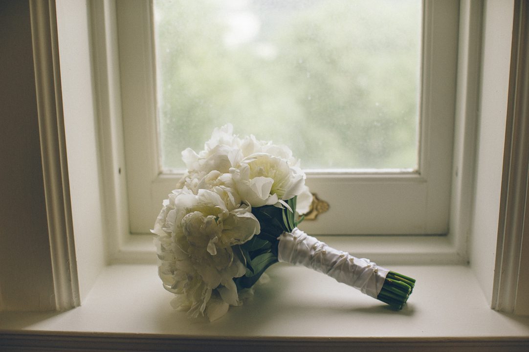 Bride's bouquet at the Castle on the Hudson in Tarrytown, NY. Captured by NYC wedding photographer Ben Lau.