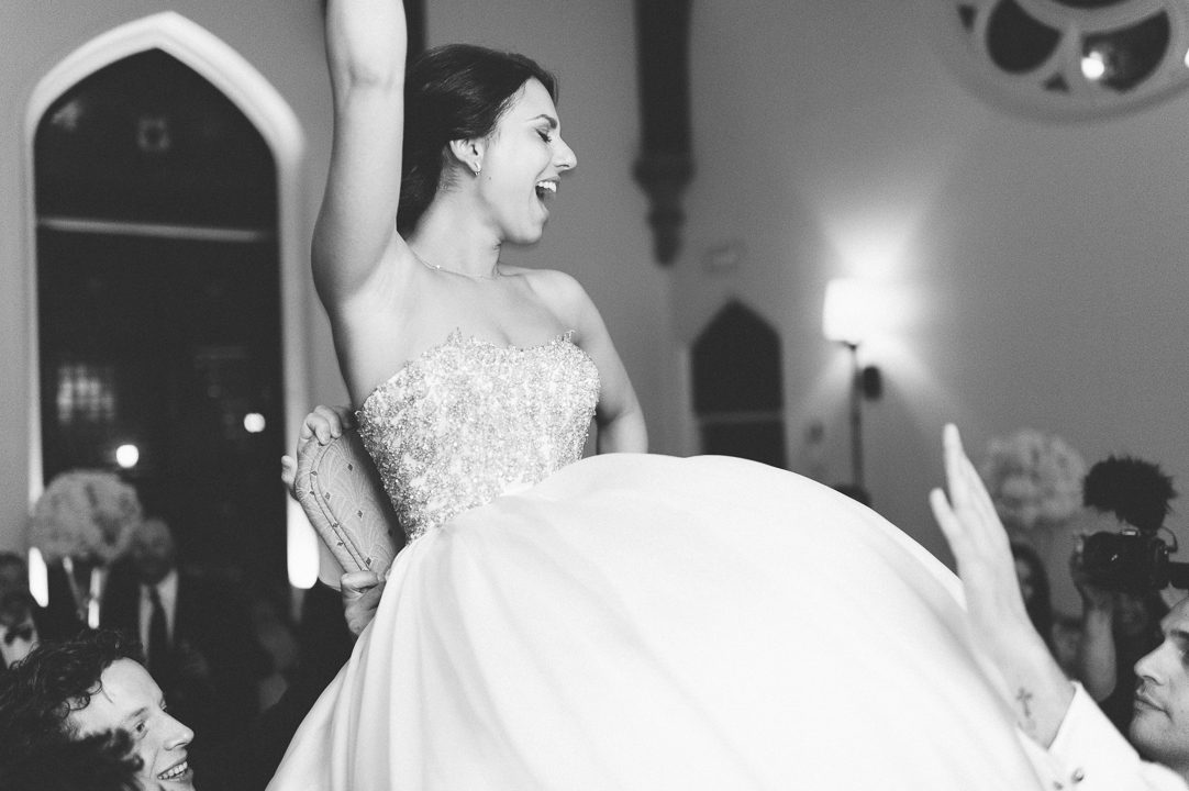Wedding chair dance at the Castle on the Hudson in Tarrytown, NY. Captured by NYC wedding photographer Ben Lau.
