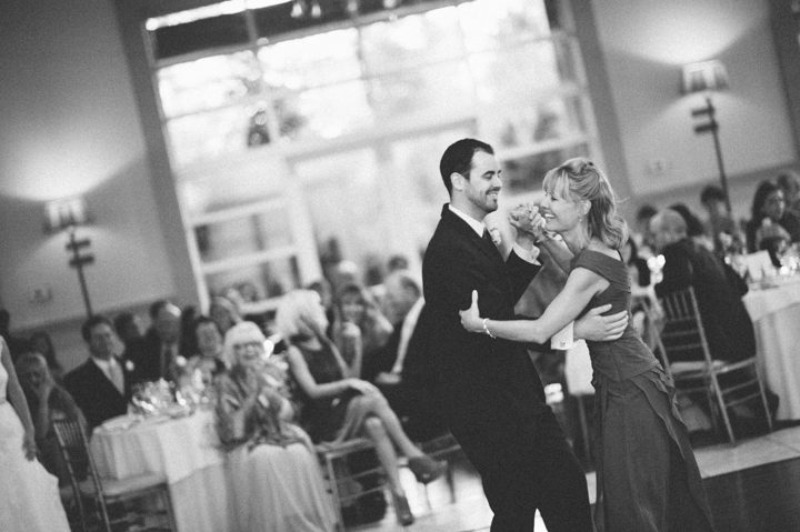 Mother and son dance during a wedding at the Stone House in Stirling Ridge. Captured by NJ wedding photographer Ben Lau.