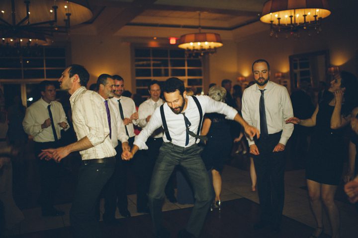 Guests dance at a wedding at the Stone House in Stirling Ridge. Captured by NJ wedding photographer Ben Lau.