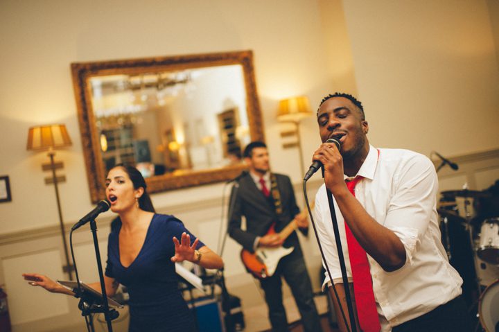 Storytellers band performs at a wedding at the Stone House in Stirling Ridge. Captured by NJ wedding photographer Ben Lau.