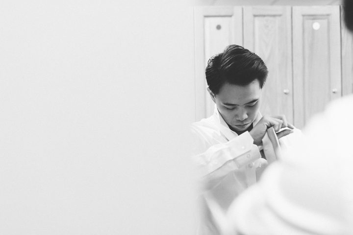 Groom preps for his wedding at Falkirk Estates in Central Valley, NY. Captured by NYC wedding photographer Ben Lau.