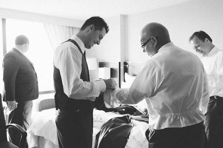 Groom preps for his wedding at the Westmount Country Club. Captured by NYC wedding photographer Ben Lau.