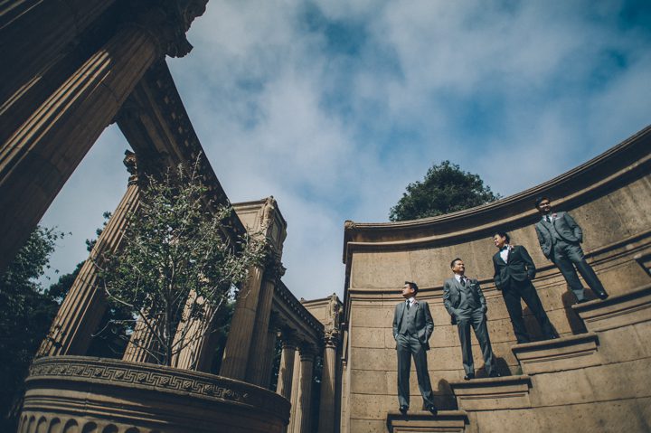 Groomsmen portraits at the Palace of Fine Arts after a wedding ceremony at the Ritz Carlton in San Francisco, CA. Captured by NYC wedding photographer Ben Lau.