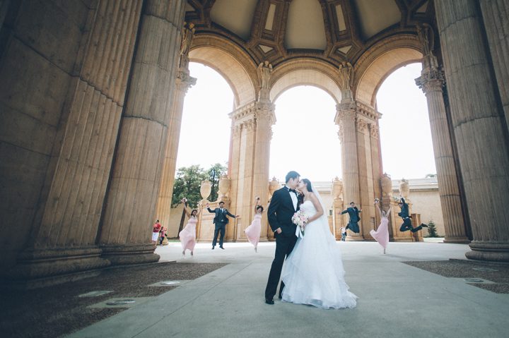 Bridal Party portraits at the Palace of Fine Arts after a wedding ceremony at the Ritz Carlton in San Francisco, CA. Captured by NYC wedding photographer Ben Lau.