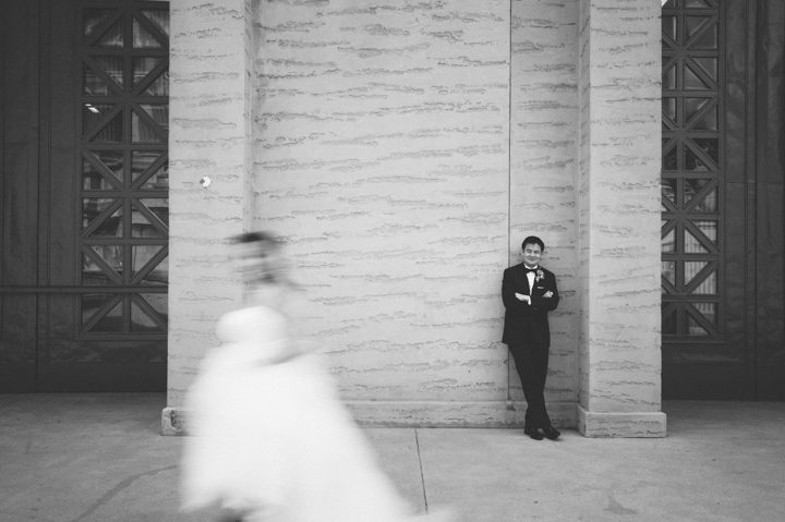 Bride and groom portraits at the Palace of Fine Arts after a wedding ceremony at the Ritz Carlton in San Francisco, CA. Captured by NYC wedding photographer Ben Lau.